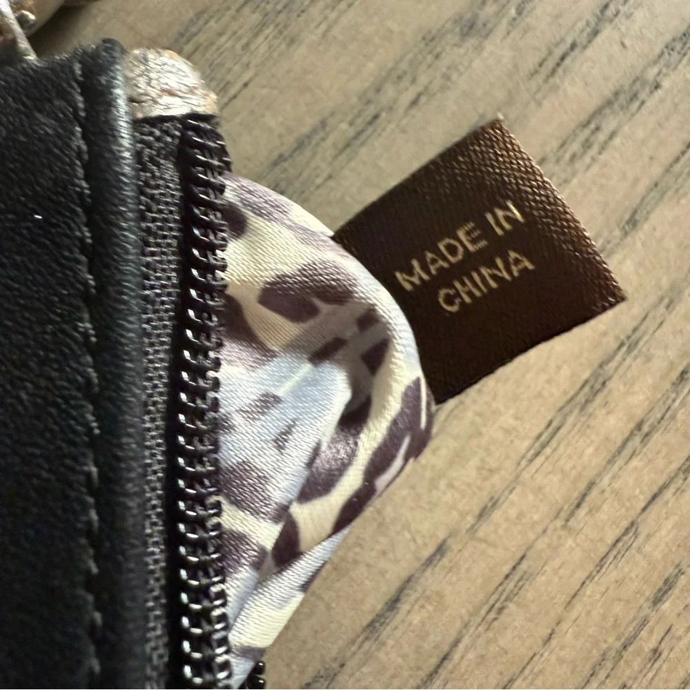 ✨Coach -Vintage poppy wristlet✨